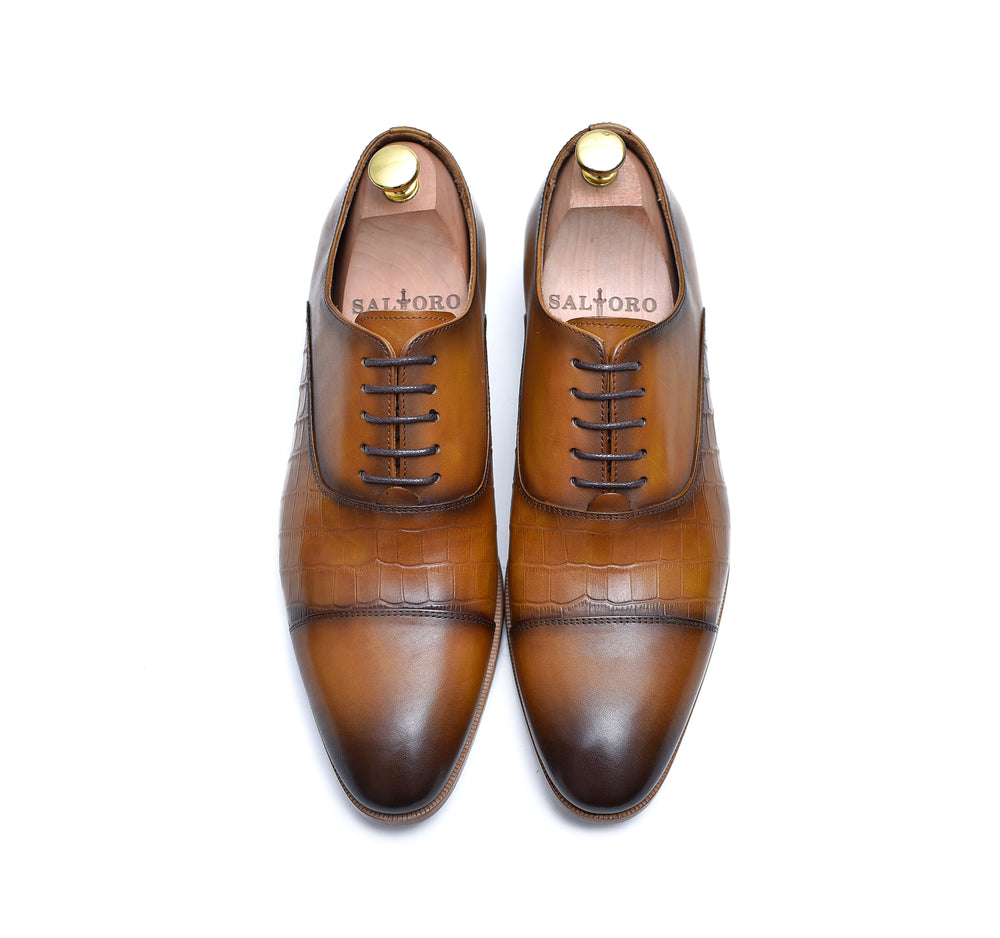 tan calf leather lace up dress shoes with burnished toe.